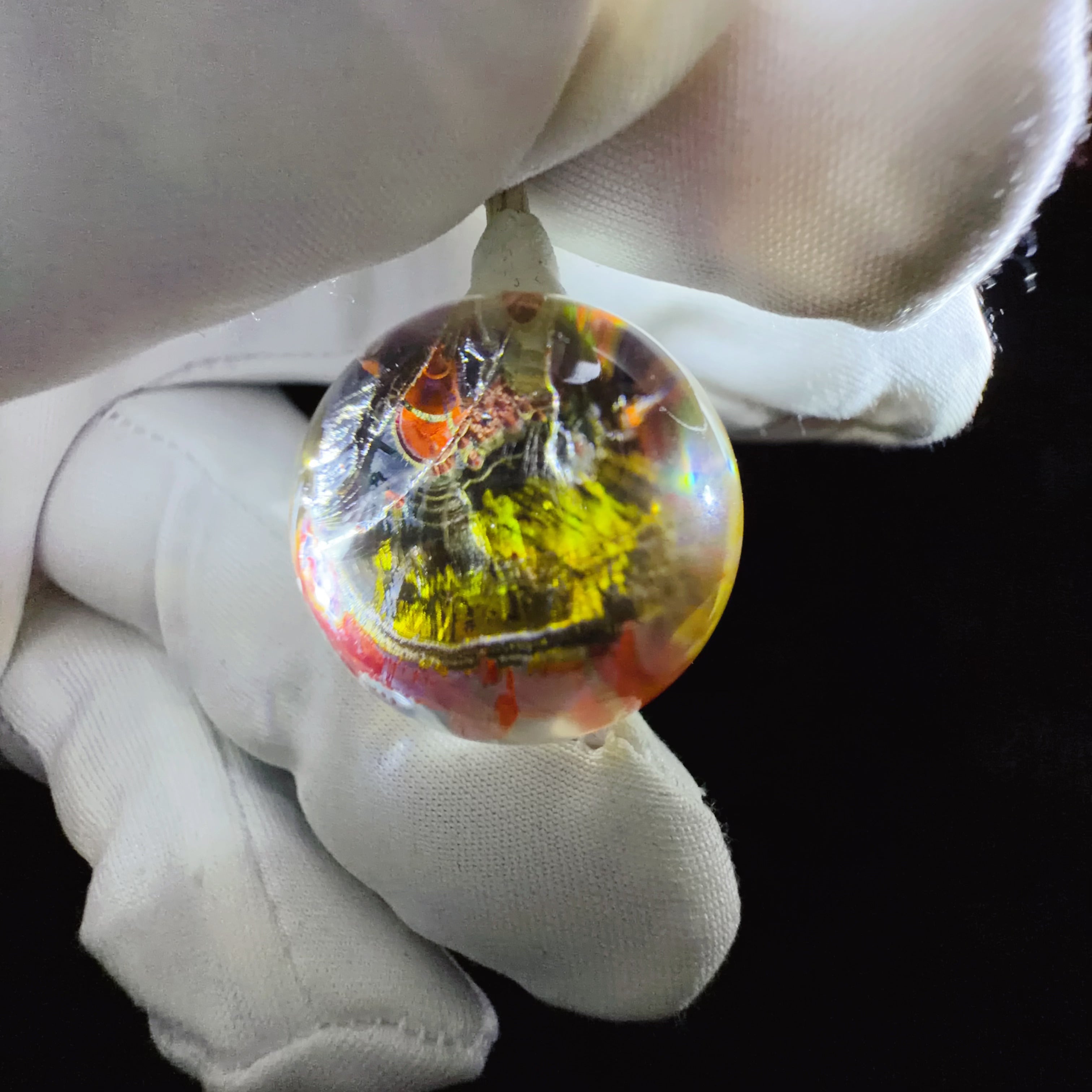 Quartz Bead with Red and Yellow Flower-like Inclusions