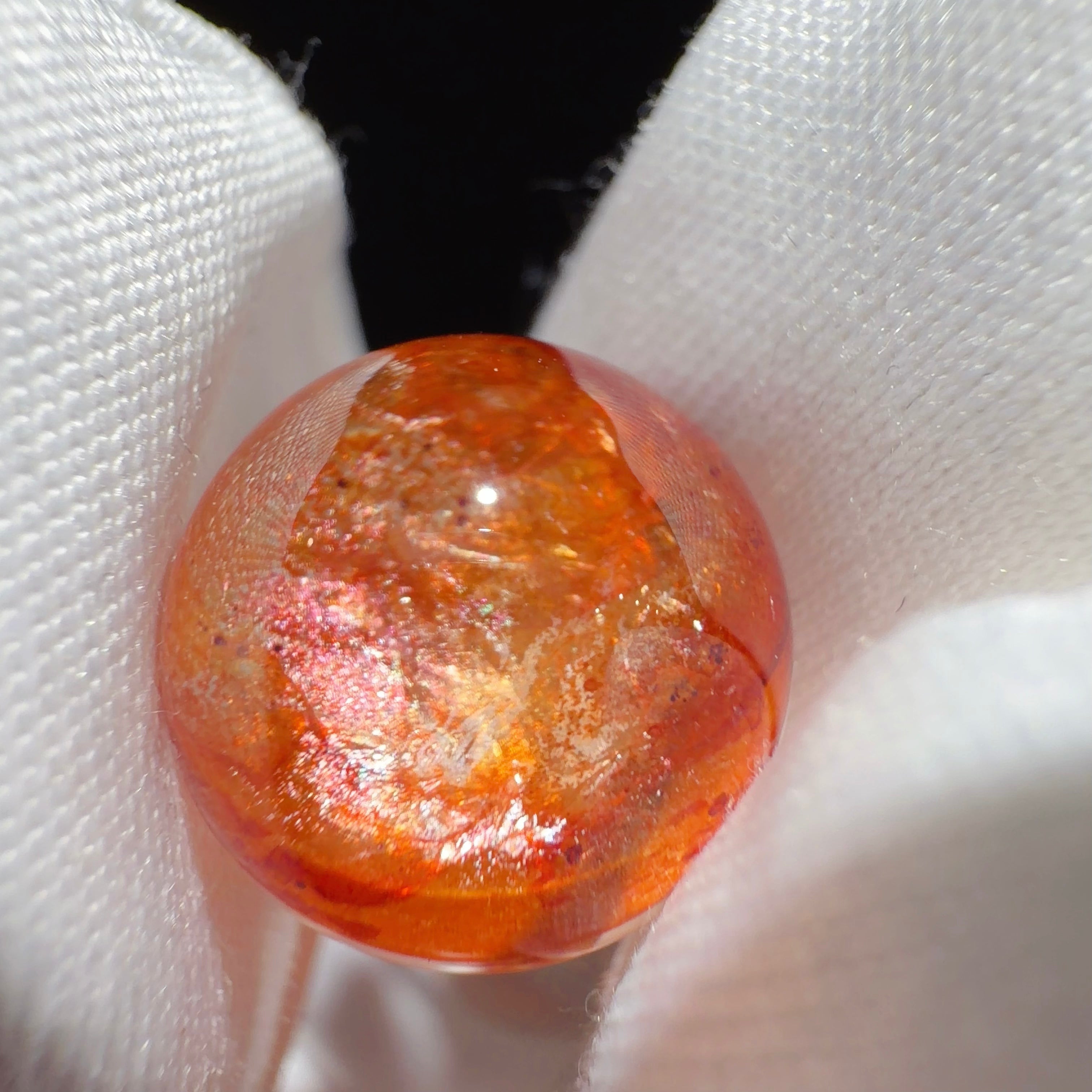 Quartz Bead with Polychrome Iron Oxide Inclusions