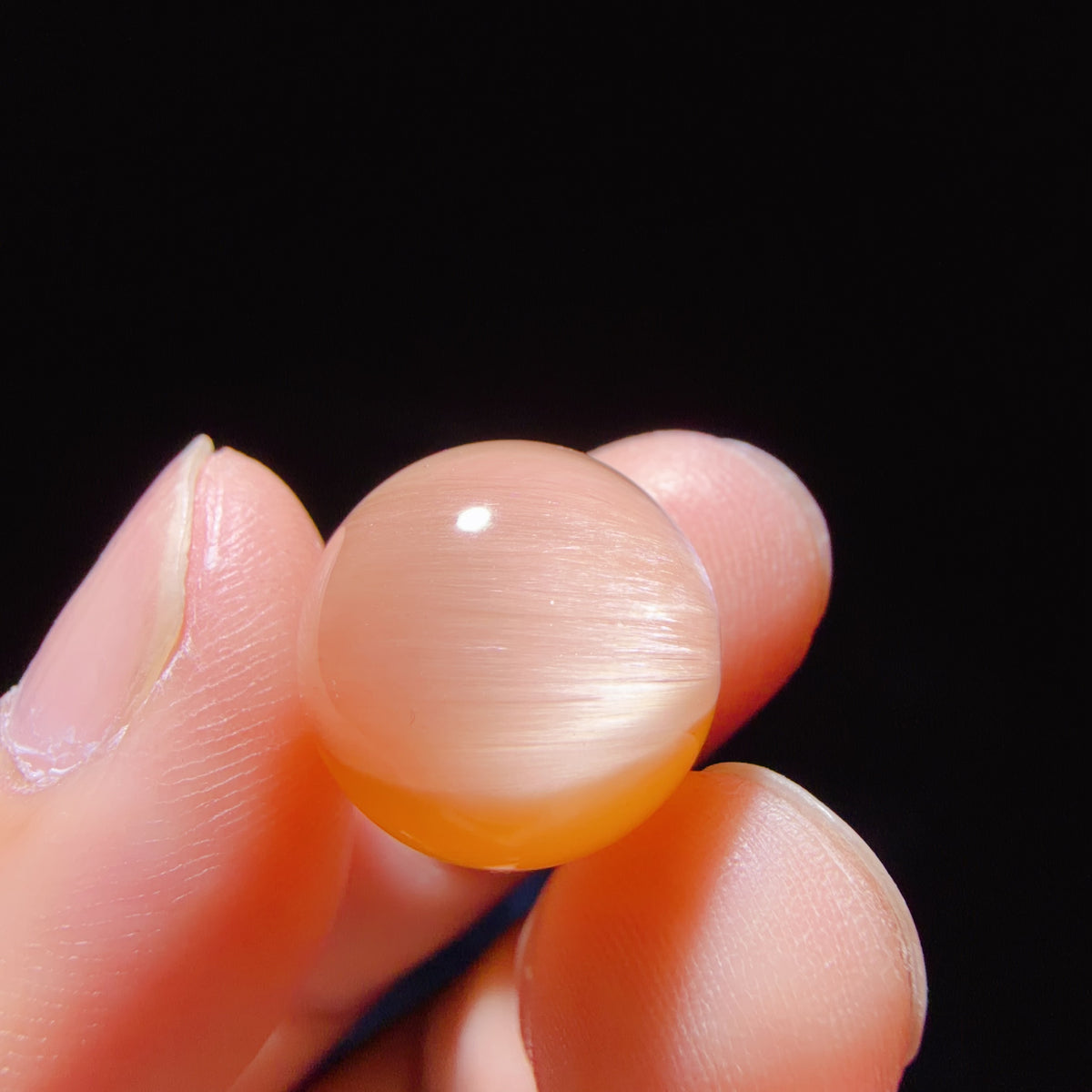 Quartz Bead with Pink Fibrous Inclusions and Bowl-shaped Phantom Growth 14.9 mm
