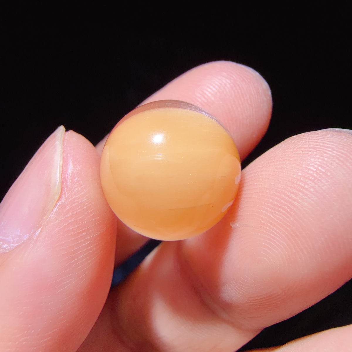 Quartz Bead with Pink Fibrous Inclusions and Bowl-shaped Phantom Growth 14.9 mm